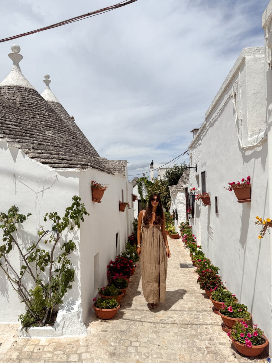 Aerial sunrise view over Alberobello, Puglia, showing hundreds of traditional trulli houses