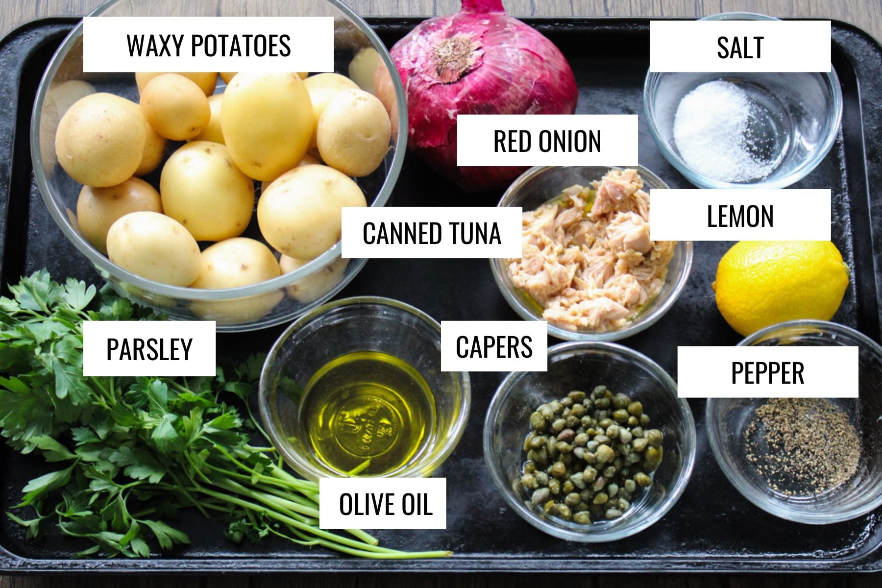 close up image of ingredients to make a tuna and potato salad.