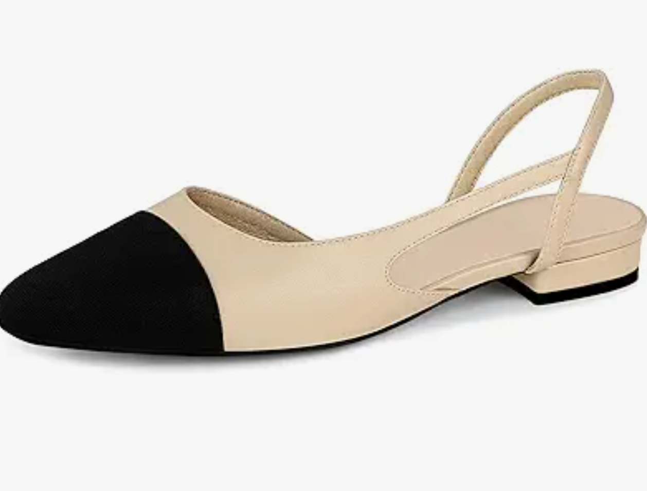 A beige slingback flat shoe with a black closed toe and low heel, featuring a minimalist design-perfect for those wondering what to wear in Italy.