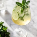 Higo spritz on a white counter.