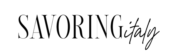 Text logo that reads SAVORING italy with SAVORING in tall, elegant capitals and italy in a flowing, handwritten script.